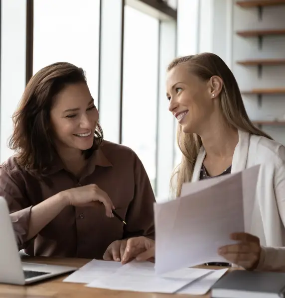 Women reviewing documents