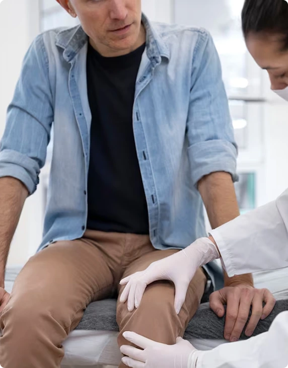 Doctor checking knee